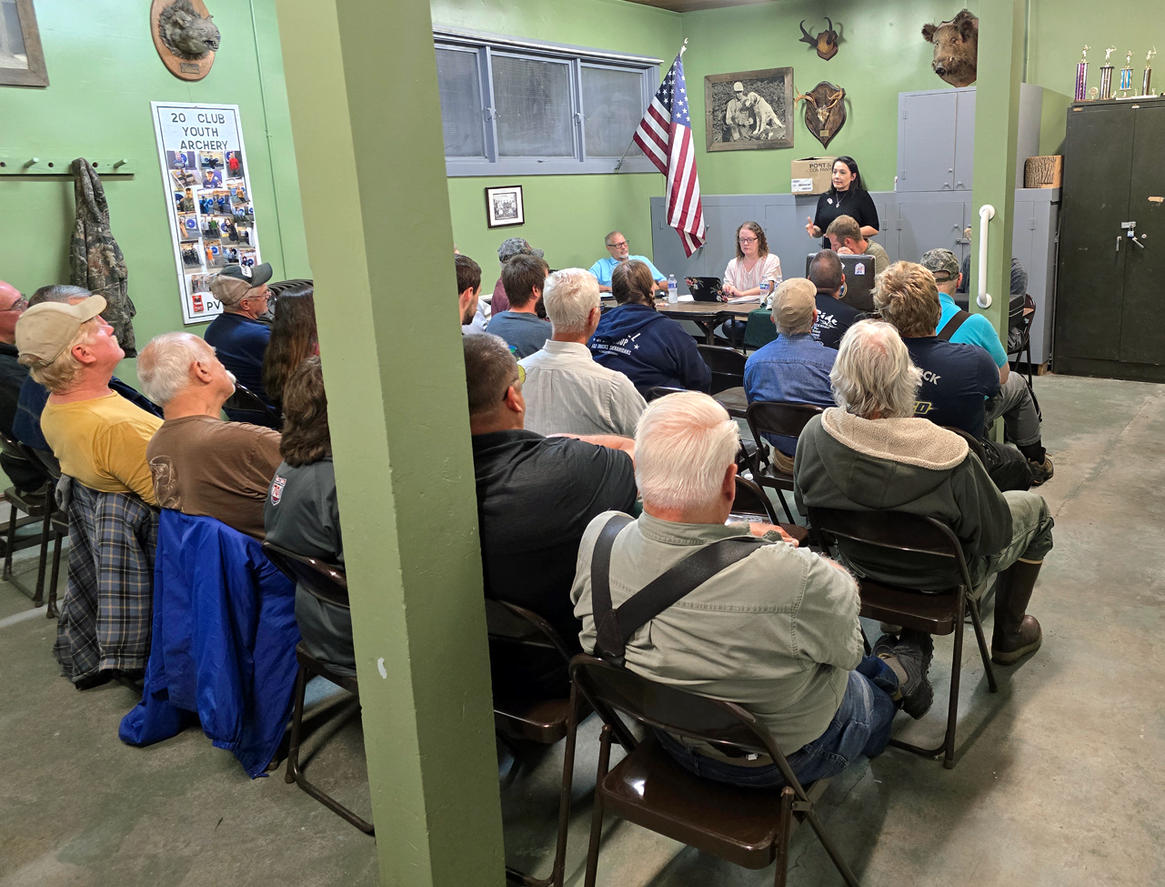 Andrea Murray speaking at a community meeting in Windsor District