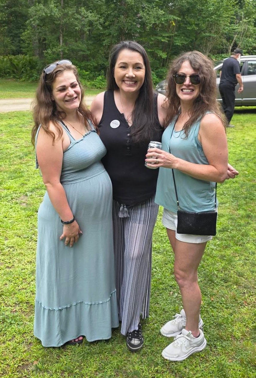Andrea Murray with community members at Camp Plymouth event